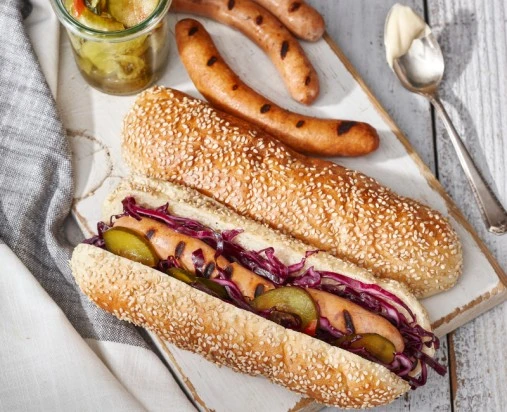 Bread & Butter Pickles and Coleslaw Hot Dog on Sesame Bun